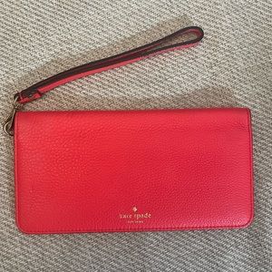 Neon coral kate spade bifold wallet / wristlet